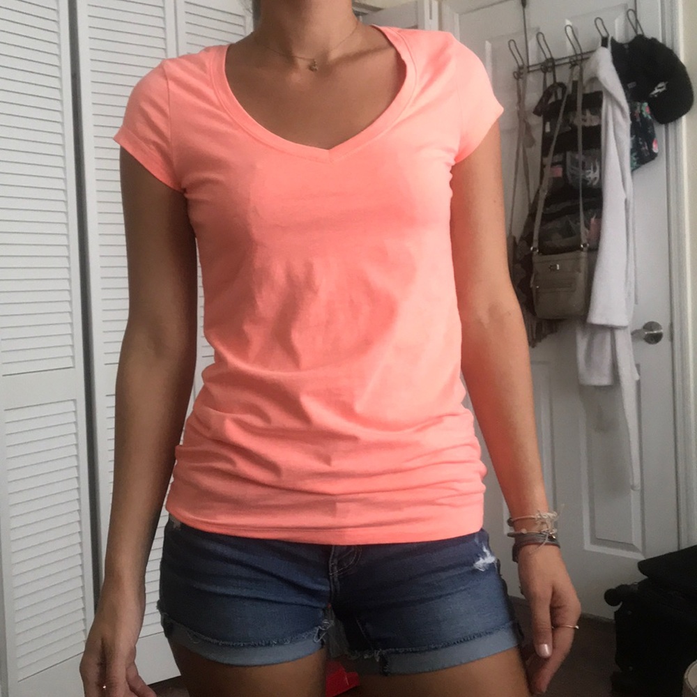Peach colored shirt